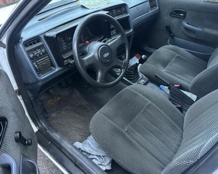 Белый Форд Сиерра, объемом двигателя 2 л и пробегом 200 тыс. км за 750 $, фото 3 на Automoto.ua