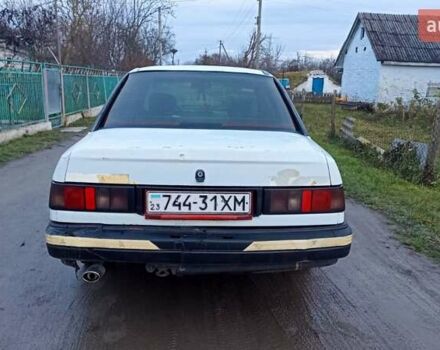 Белый Форд Сиерра, объемом двигателя 2 л и пробегом 300 тыс. км за 650 $, фото 4 на Automoto.ua