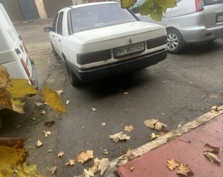 Белый Форд Сиерра, объемом двигателя 2 л и пробегом 222 тыс. км за 750 $, фото 2 на Automoto.ua