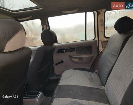 Білий Форд Сієрра, об'ємом двигуна 2 л та пробігом 200 тис. км за 1300 $, фото 6 на Automoto.ua