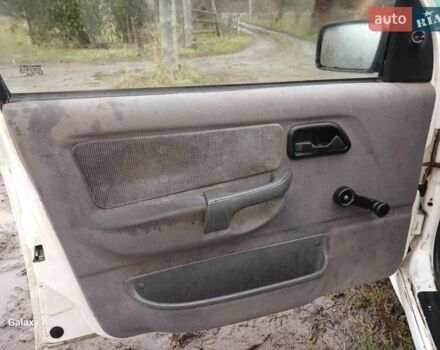 Білий Форд Сієрра, об'ємом двигуна 2 л та пробігом 200 тис. км за 1300 $, фото 11 на Automoto.ua