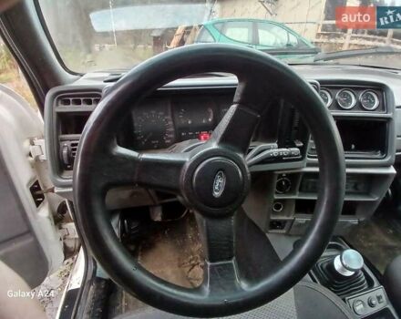 Білий Форд Сієрра, об'ємом двигуна 2 л та пробігом 200 тис. км за 1300 $, фото 7 на Automoto.ua