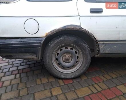 Білий Форд Сієрра, об'ємом двигуна 2 л та пробігом 300 тис. км за 500 $, фото 1 на Automoto.ua
