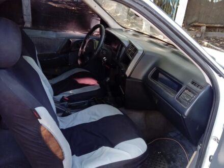 Белый Форд Сиерра, объемом двигателя 2 л и пробегом 200 тыс. км за 550 $, фото 1 на Automoto.ua