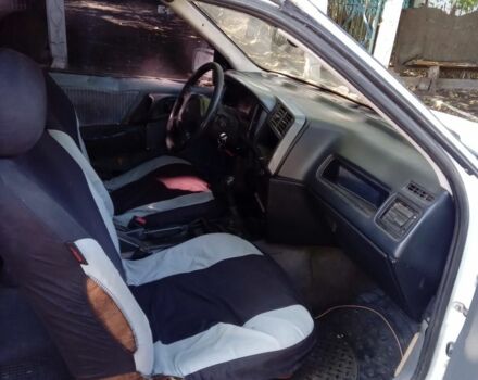 Белый Форд Сиерра, объемом двигателя 2 л и пробегом 200 тыс. км за 550 $, фото 1 на Automoto.ua