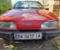 Красный Форд Сиерра, объемом двигателя 2 л и пробегом 300 тыс. км за 700 $, фото 1 на Automoto.ua