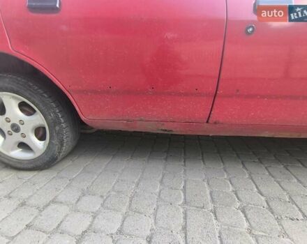 Красный Форд Сиерра, объемом двигателя 1.6 л и пробегом 100 тыс. км за 700 $, фото 1 на Automoto.ua