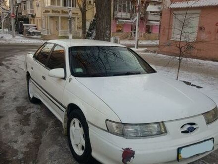 Білий Форд Taurus, об'ємом двигуна 3 л та пробігом 122 тис. км за 2200 $, фото 1 на Automoto.ua