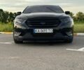 Чорний Форд Taurus, об'ємом двигуна 3.5 л та пробігом 215 тис. км за 12494 $, фото 1 на Automoto.ua