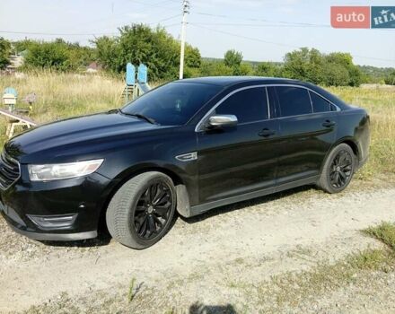 Черный Форд Таурус, объемом двигателя 2 л и пробегом 260 тыс. км за 12050 $, фото 1 на Automoto.ua