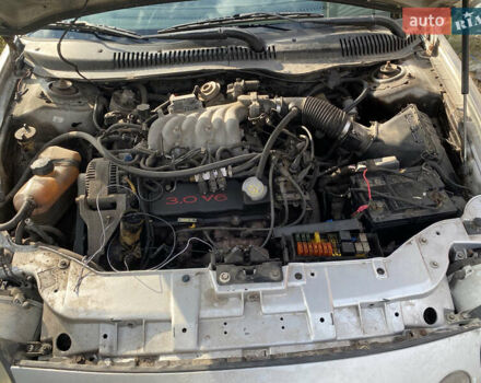 Серый Форд Таурус, объемом двигателя 3 л и пробегом 100 тыс. км за 600 $, фото 8 на Automoto.ua