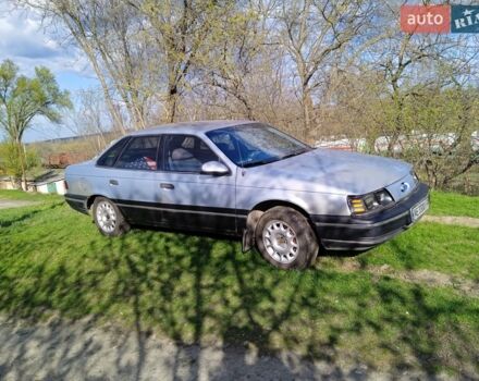 Сірий Форд Taurus, об'ємом двигуна 2 л та пробігом 300 тис. км за 2000 $, фото 1 на Automoto.ua