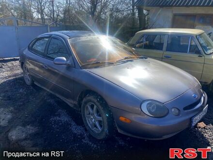 Сірий Форд Taurus, об'ємом двигуна 3 л та пробігом 261 тис. км за 1650 $, фото 1 на Automoto.ua