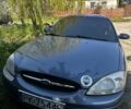 Синий Форд Таурус, объемом двигателя 3 л и пробегом 180 тыс. км за 1600 $, фото 1 на Automoto.ua