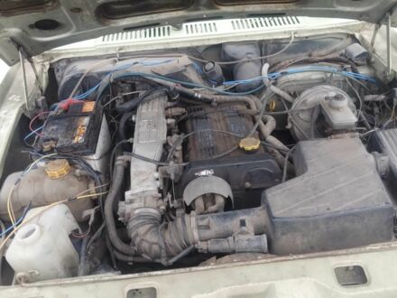 Зеленый Форд Таурус, объемом двигателя 2 л и пробегом 77 тыс. км за 450 $, фото 1 на Automoto.ua