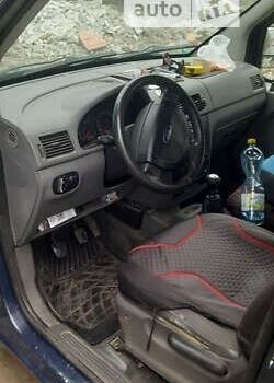 Синий Форд Турнео Коннект, объемом двигателя 1.8 л и пробегом 350 тыс. км за 3500 $, фото 4 на Automoto.ua