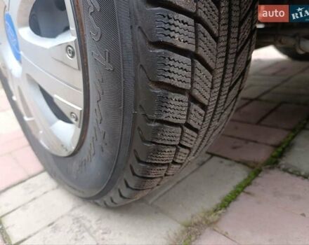 Белый Форд Транзит Коннект, объемом двигателя 1.8 л и пробегом 233 тыс. км за 4900 $, фото 2 на Automoto.ua