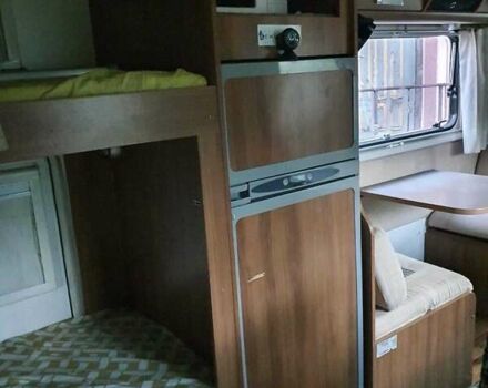 Белый Форд Транзит, объемом двигателя 2.2 л и пробегом 240 тыс. км за 35542 $, фото 4 на Automoto.ua