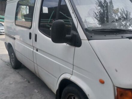 Белый Форд Транзит пасс., объемом двигателя 2.5 л и пробегом 259 тыс. км за 3700 $, фото 1 на Automoto.ua