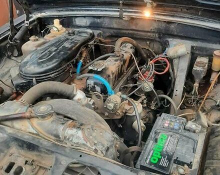 Черный ГАЗ 24 Волга, объемом двигателя 2 л и пробегом 100 тыс. км за 500 $, фото 2 на Automoto.ua