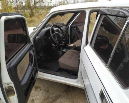 Белый ГАЗ 3110 Волга, объемом двигателя 2 л и пробегом 200 тыс. км за 1700 $, фото 1 на Automoto.ua