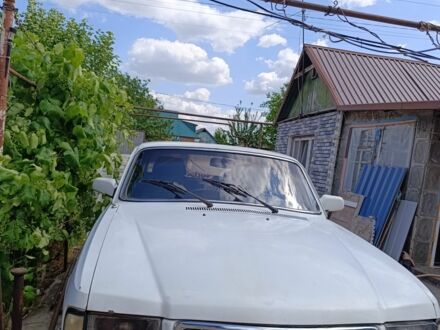 Белый ГАЗ 3110 Волга, объемом двигателя 2.3 л и пробегом 267 тыс. км за 471 $, фото 1 на Automoto.ua