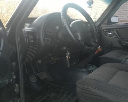 Черный ГАЗ 3110 Волга, объемом двигателя 2.4 л и пробегом 100 тыс. км за 2000 $, фото 4 на Automoto.ua