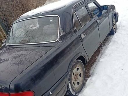 Черный ГАЗ 3110 Волга, объемом двигателя 2 л и пробегом 318 тыс. км за 809 $, фото 1 на Automoto.ua