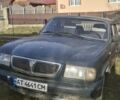 Зеленый ГАЗ 3110 Волга, объемом двигателя 2.45 л и пробегом 119 тыс. км за 699 $, фото 1 на Automoto.ua