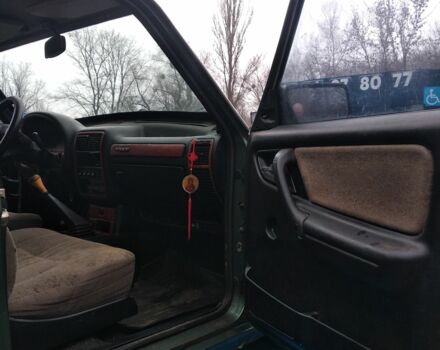 Зеленый ГАЗ 3110 Волга, объемом двигателя 2.3 л и пробегом 250 тыс. км за 616 $, фото 13 на Automoto.ua