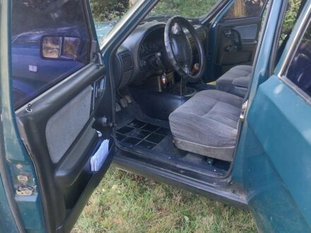 Зеленый ГАЗ 3110 Волга, объемом двигателя 2 л и пробегом 250 тыс. км за 1000 $, фото 1 на Automoto.ua