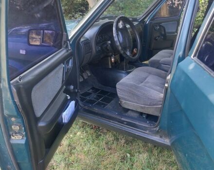 Зеленый ГАЗ 3110 Волга, объемом двигателя 2 л и пробегом 250 тыс. км за 1000 $, фото 1 на Automoto.ua