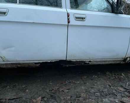 Белый ГАЗ 31105 Волга, объемом двигателя 2.3 л и пробегом 200 тыс. км за 600 $, фото 3 на Automoto.ua