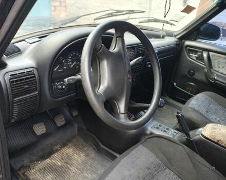 Черный ГАЗ 31105 Волга, объемом двигателя 2.4 л и пробегом 62 тыс. км за 2140 $, фото 1 на Automoto.ua
