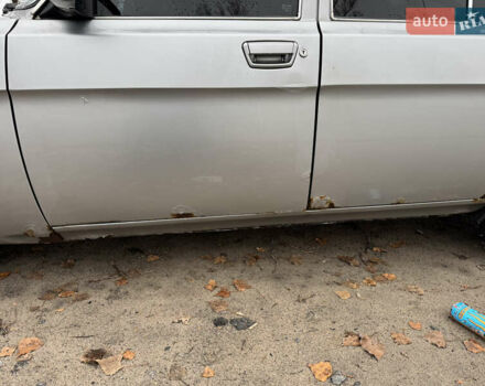 Серый ГАЗ 31105 Волга, объемом двигателя 2.29 л и пробегом 190 тыс. км за 1150 $, фото 7 на Automoto.ua