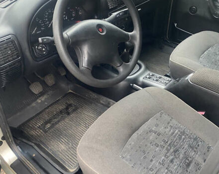 Серый ГАЗ 31105 Волга, объемом двигателя 2.29 л и пробегом 155 тыс. км за 2000 $, фото 2 на Automoto.ua