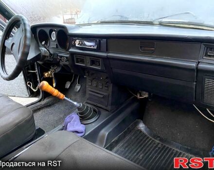 Черный ГАЗ Волга, объемом двигателя 2.4 л и пробегом 260 тыс. км за 820 $, фото 4 на Automoto.ua