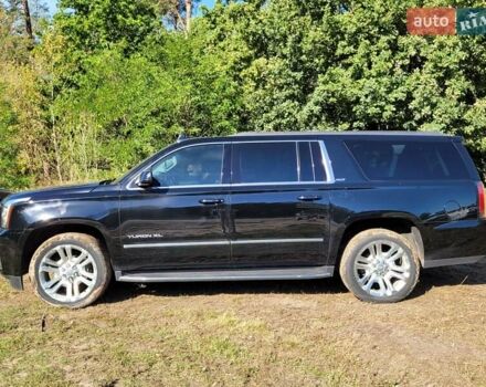Черный ДжиЭмСи Юкон, объемом двигателя 5.33 л и пробегом 101 тыс. км за 50000 $, фото 1 на Automoto.ua