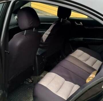 Черный Джили Эмгранд 7 (EC7), объемом двигателя 1.8 л и пробегом 208 тыс. км за 3800 $, фото 6 на Automoto.ua