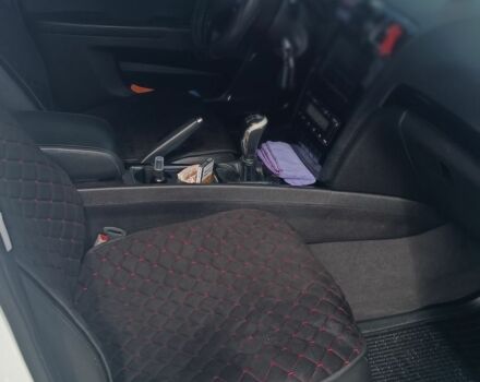 Білий Джилі Емгранд, об'ємом двигуна 2 л та пробігом 137 тис. км за 6250 $, фото 4 на Automoto.ua