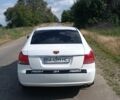 Білий Джилі Емгранд, об'ємом двигуна 2 л та пробігом 137 тис. км за 6250 $, фото 3 на Automoto.ua
