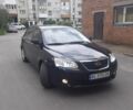 Черный Джили Эмгранд, объемом двигателя 1.8 л и пробегом 220 тыс. км за 4500 $, фото 1 на Automoto.ua