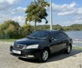 Черный Джили Эмгранд, объемом двигателя 1.8 л и пробегом 230 тыс. км за 3550 $, фото 1 на Automoto.ua