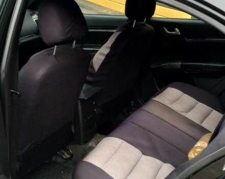 Черный Джили Эмгранд, объемом двигателя 1.8 л и пробегом 208 тыс. км за 3800 $, фото 8 на Automoto.ua