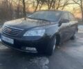 Черный Джили Эмгранд, объемом двигателя 1.8 л и пробегом 150 тыс. км за 4000 $, фото 1 на Automoto.ua