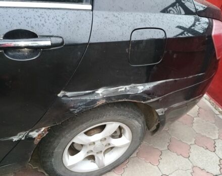 Черный Джили Эмгранд, объемом двигателя 1.8 л и пробегом 150 тыс. км за 2000 $, фото 2 на Automoto.ua