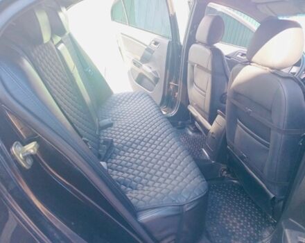 Черный Джили Эмгранд, объемом двигателя 1.8 л и пробегом 111 тыс. км за 5000 $, фото 6 на Automoto.ua