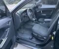 Чорний Джилі Емгранд, об'ємом двигуна 2 л та пробігом 135 тис. км за 5750 $, фото 4 на Automoto.ua
