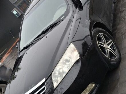 Черный Джили Эмгранд, объемом двигателя 1.8 л и пробегом 260 тыс. км за 2500 $, фото 1 на Automoto.ua