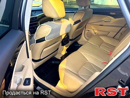 Чорний Джилі Емгранд, об'ємом двигуна 2.4 л та пробігом 86 тис. км за 10000 $, фото 1 на Automoto.ua